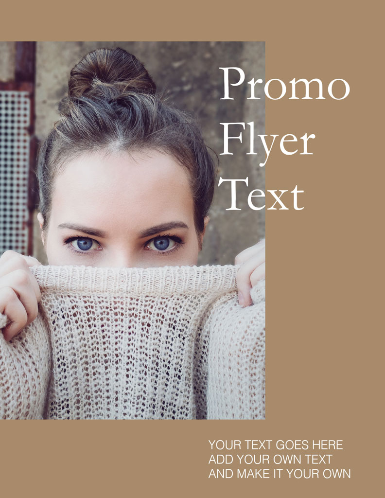 Woman holding a knitted fabric in front of her face