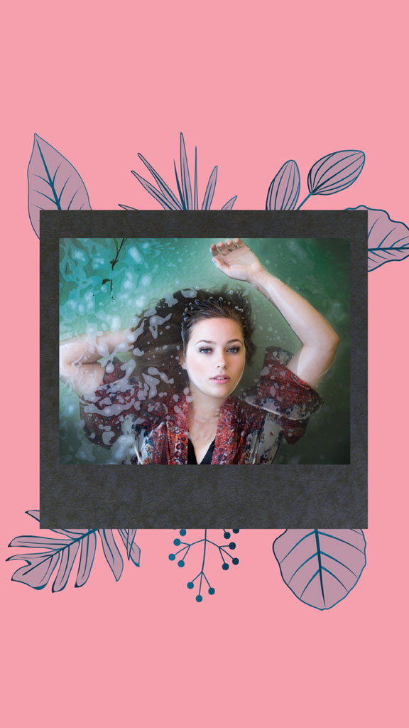 Woman floating in water with flowers