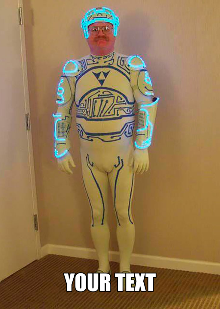 Man in white and blue costume standing in a corner