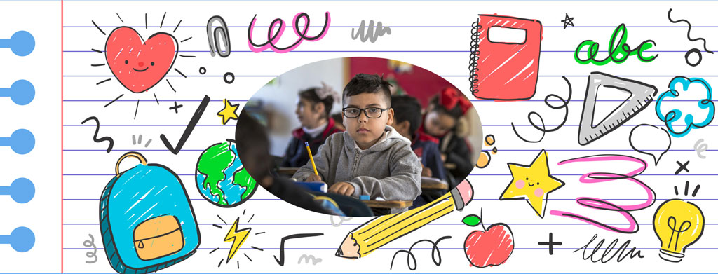 A boy writing with educational doodles around him