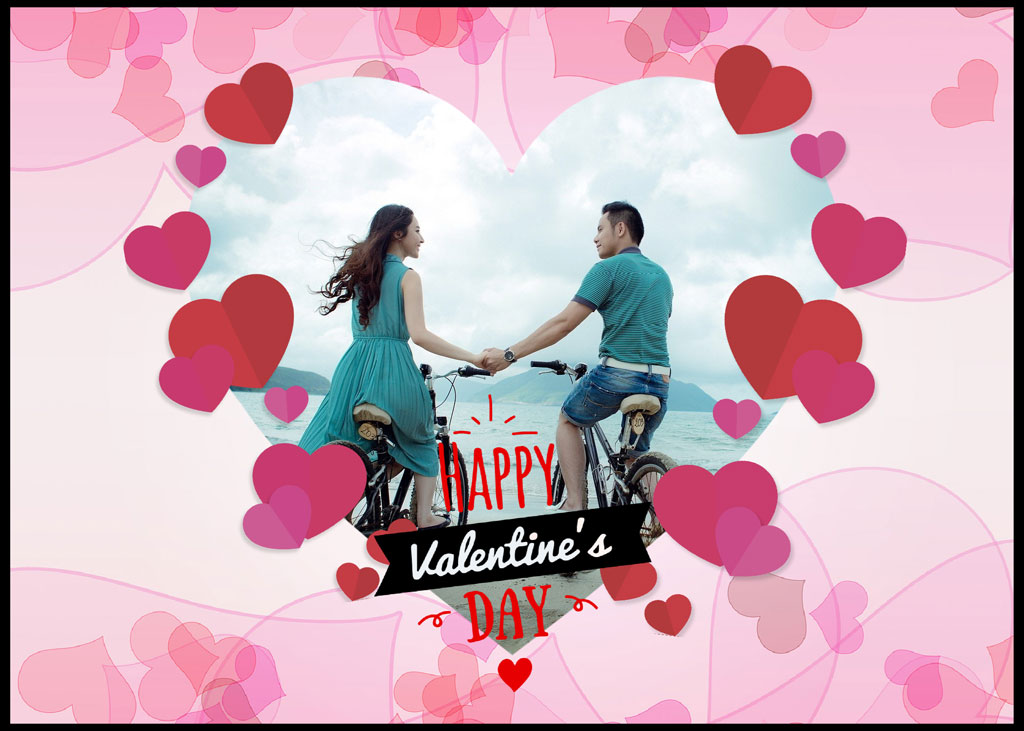 Couple holding hands while riding bicycles on Valentine's Day