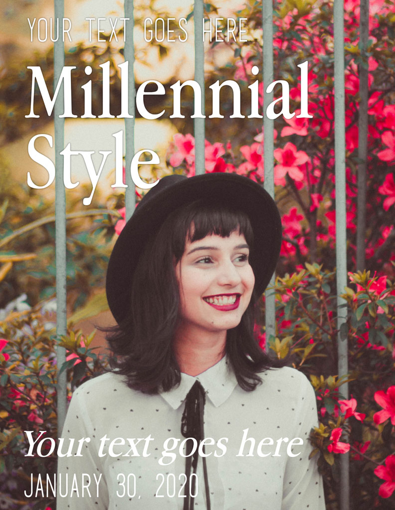 A smiling young woman wearing a black hat and white shirt with black dots, standing in front of a flowering bush.