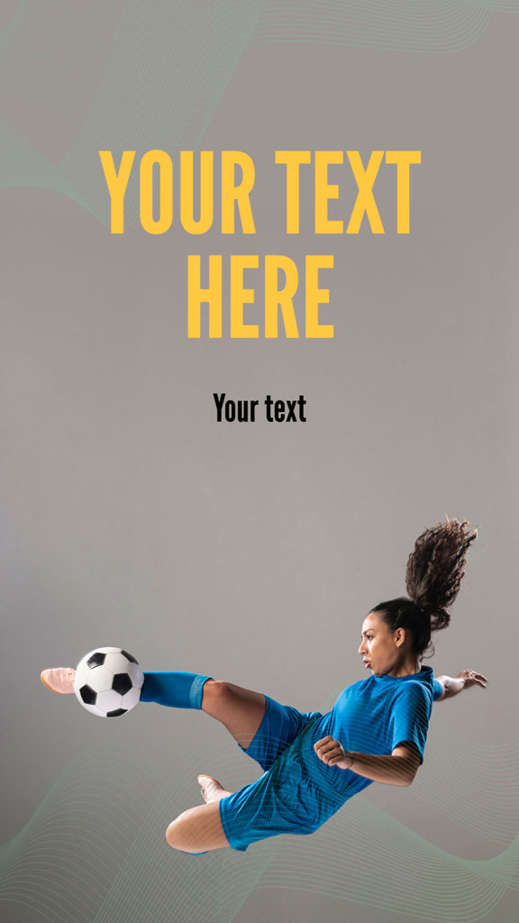 Woman kicking a soccer ball in mid-air