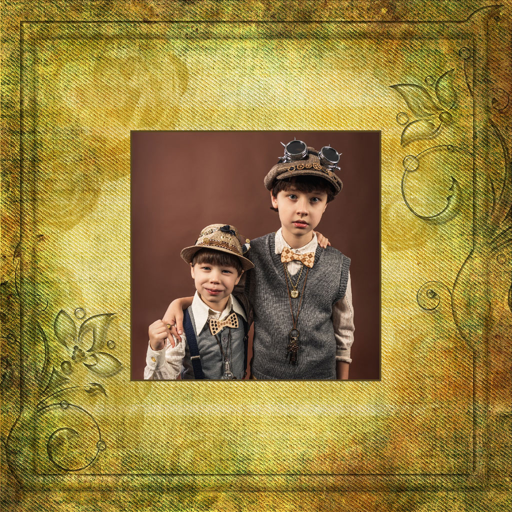 Two boys in vintage clothing posing for a picture