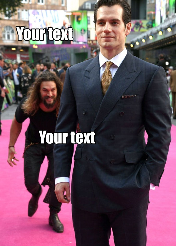 Man in a suit on a pink carpet with another man running behind him