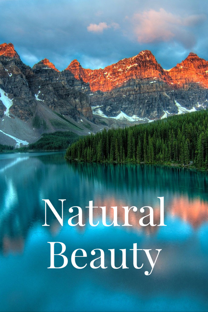 A serene lake surrounded by mountains and trees, reflecting natural beauty.