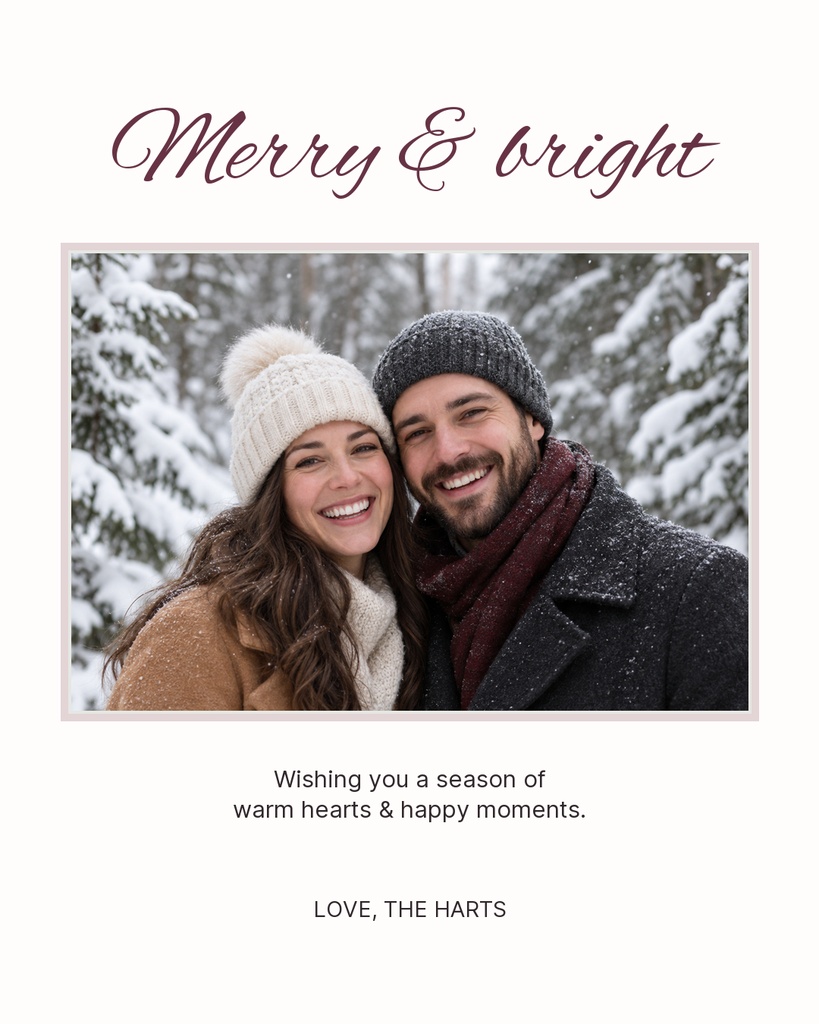 Couple smiling in winter coats and hats with Merry & Bright greeting above.