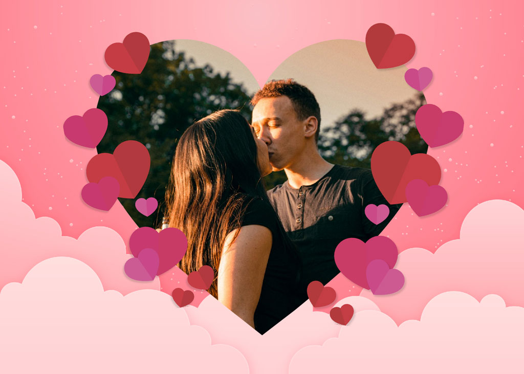 Couple embracing in a heart-shaped frame with hearts and clouds