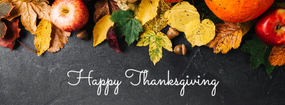 Autumn leaves and fruits with Happy Thanksgiving text