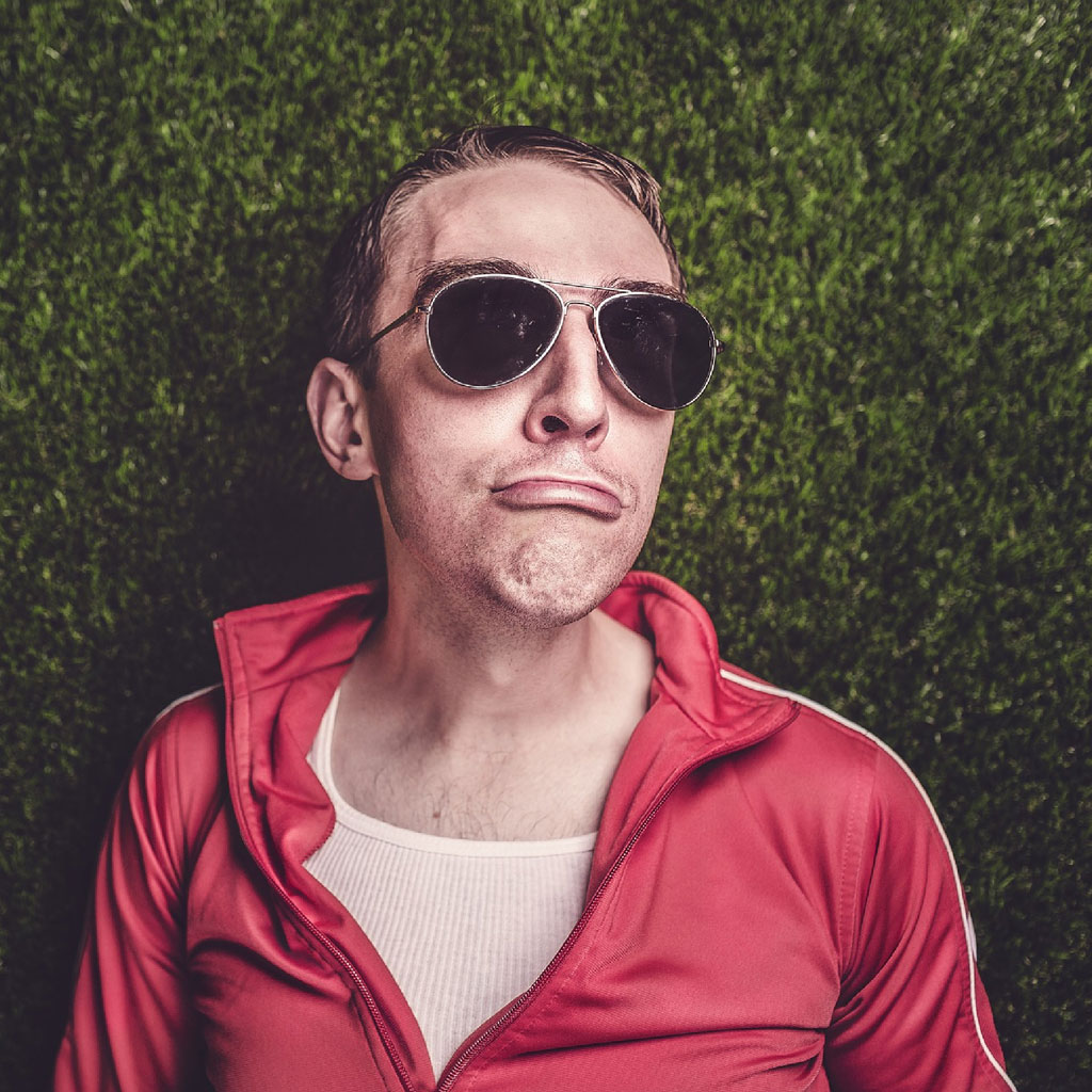 Man in red jacket and sunglasses
