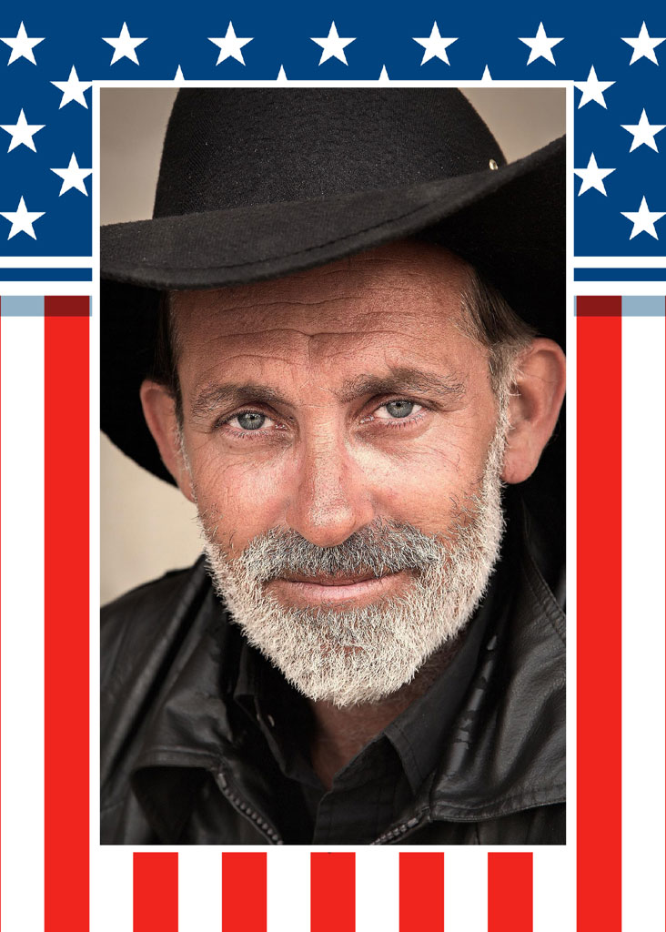Man in black cowboy hat and leather jacket against American flag background