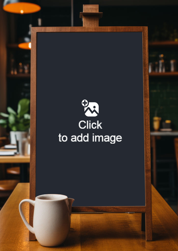 A blank chalkboard on an easel with a white pitcher on a wooden table in a cafe