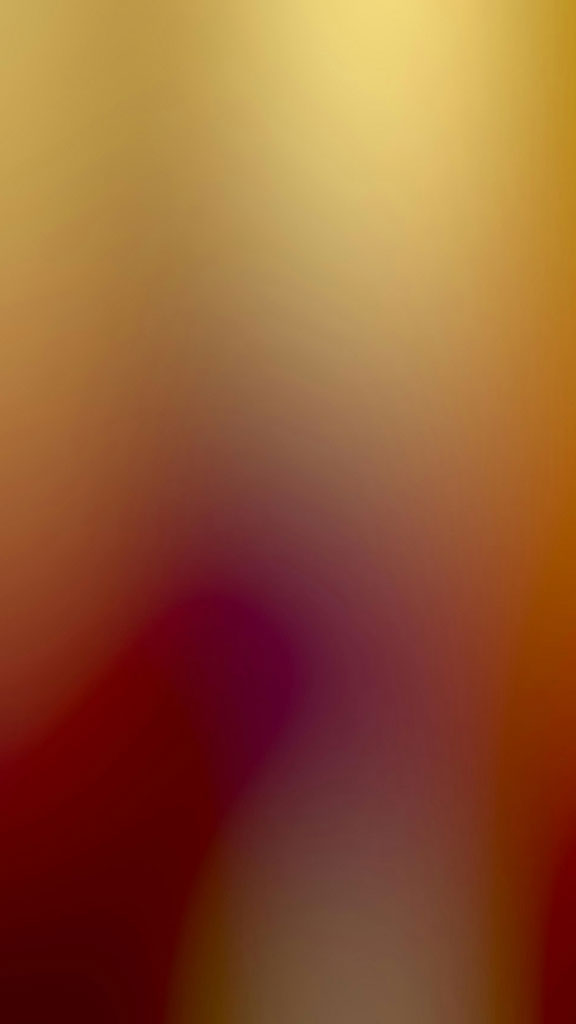 A blurred gradient background with shades of yellow, orange, and red.