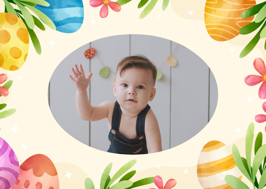 Baby waving in front of a white wall with Easter eggs and flowers around