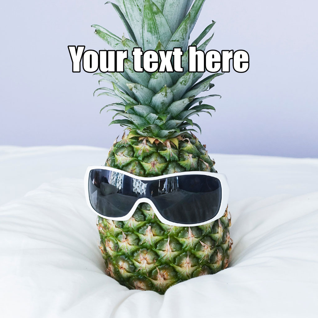 Pineapple with sunglasses on a white pillow