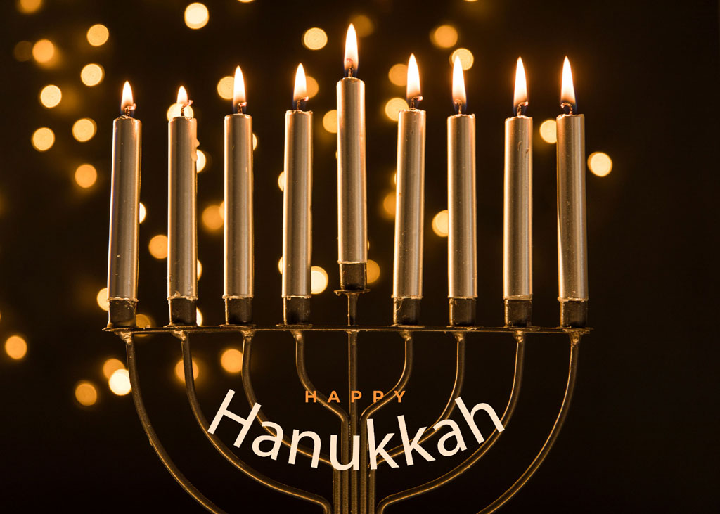 Lit Menorah with Happy Hanukkah text