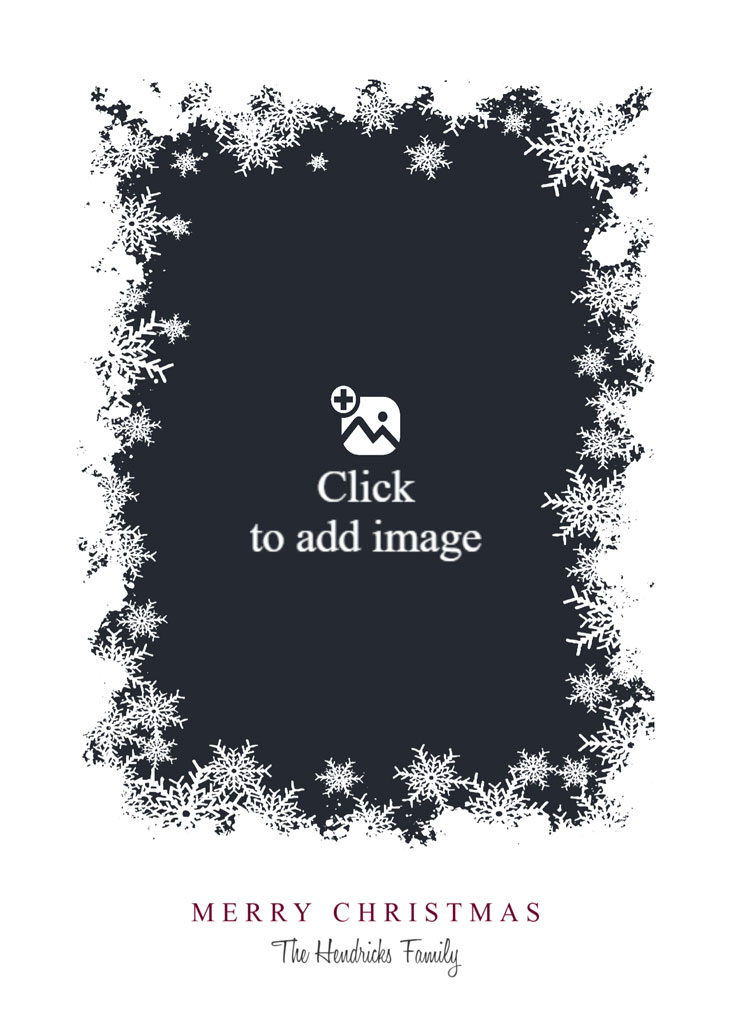 Family of three in winter clothing standing in front of a snowy tree