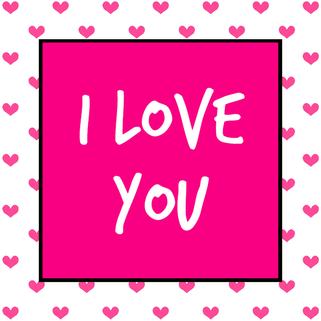 A card with 'I LOVE YOU' written on it, surrounded by pink hearts.
