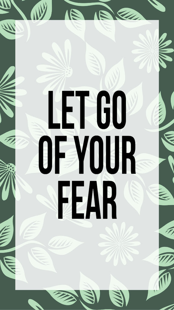 Inspirational quote 'Let go of your fear' on a floral background