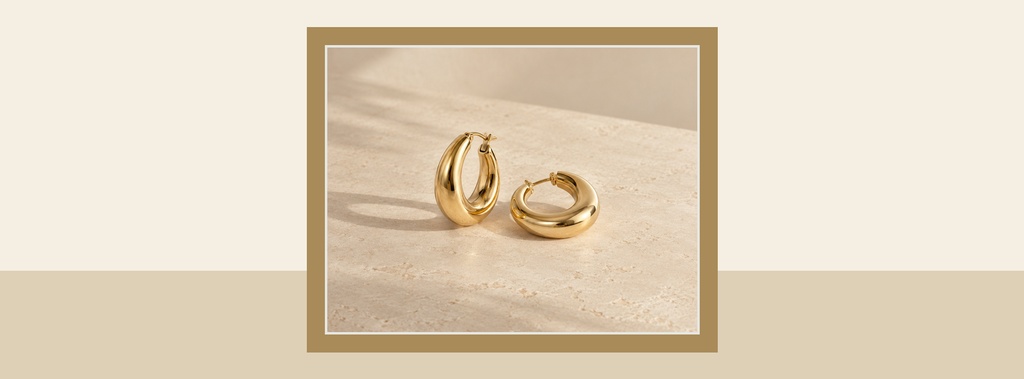 Two gold earrings on a beige background with a framed page cover layout.