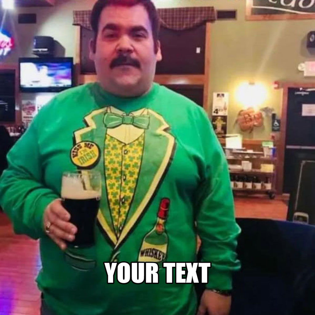 Man in green sweater holding beer