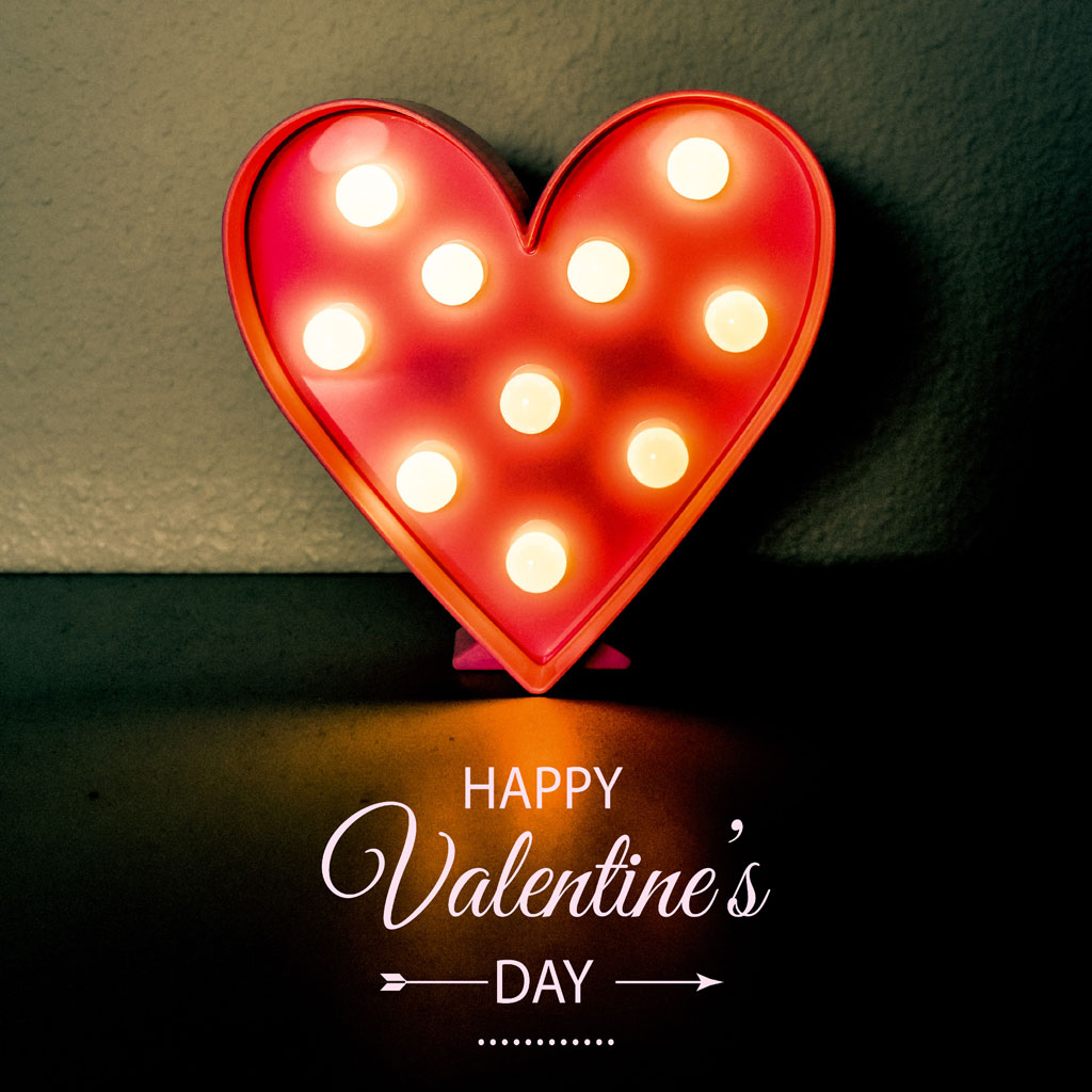 Heart-shaped decoration with glowing bulbs