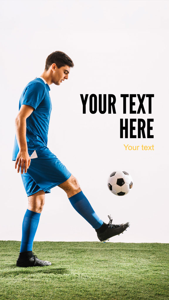 A man in blue soccer uniform kicking a soccer ball