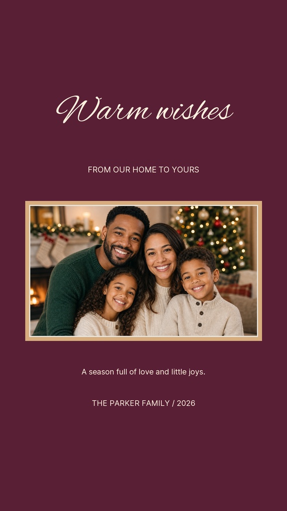 Portrait holiday card with warm wishes text, a family photo, and a maroon background.