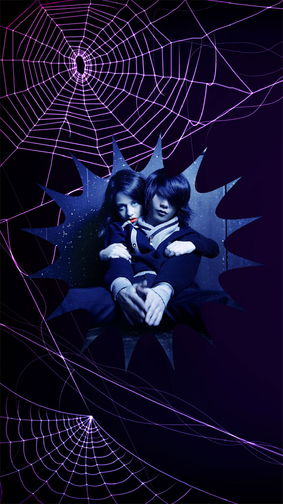 Twin girls in dark dresses sitting together, surrounded by a large spider web.