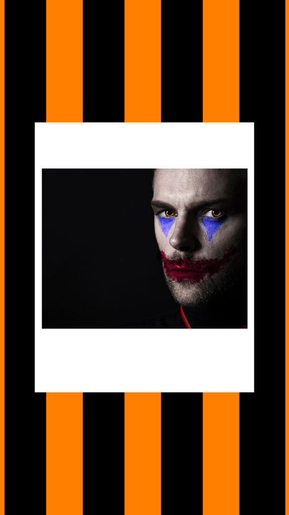 Joker's face with blue and red paint