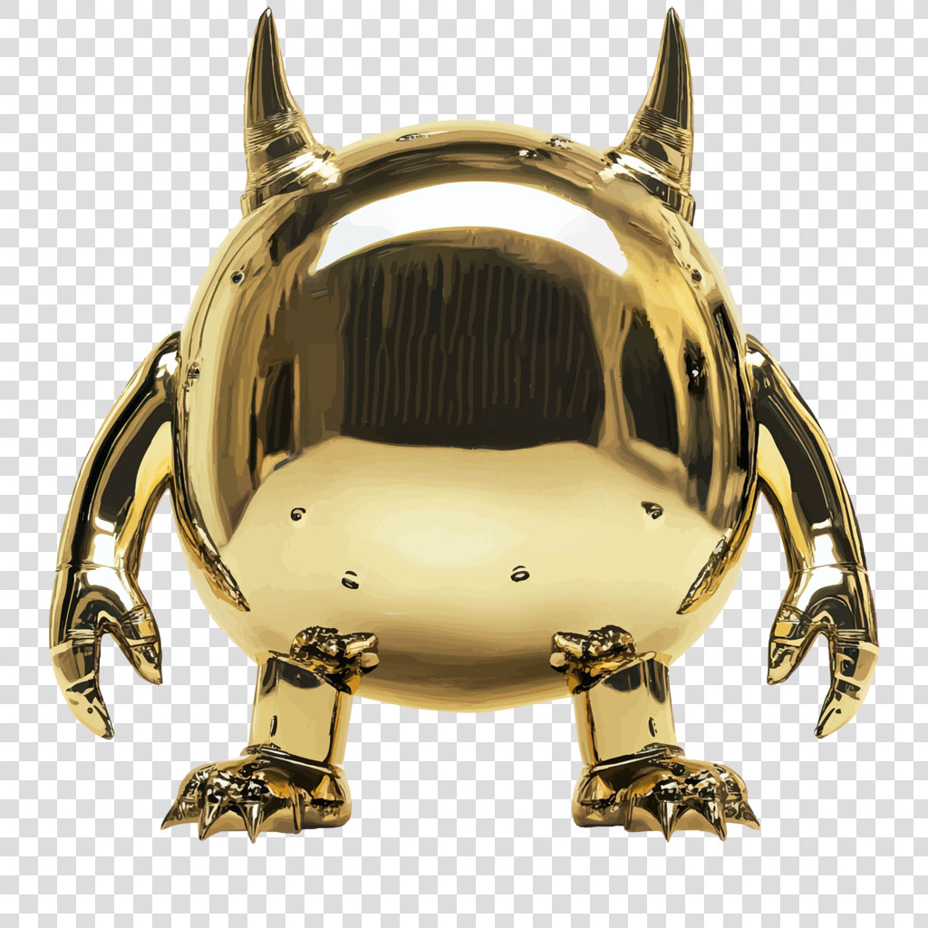 A golden figurine shaped like a monster with horns and claws.