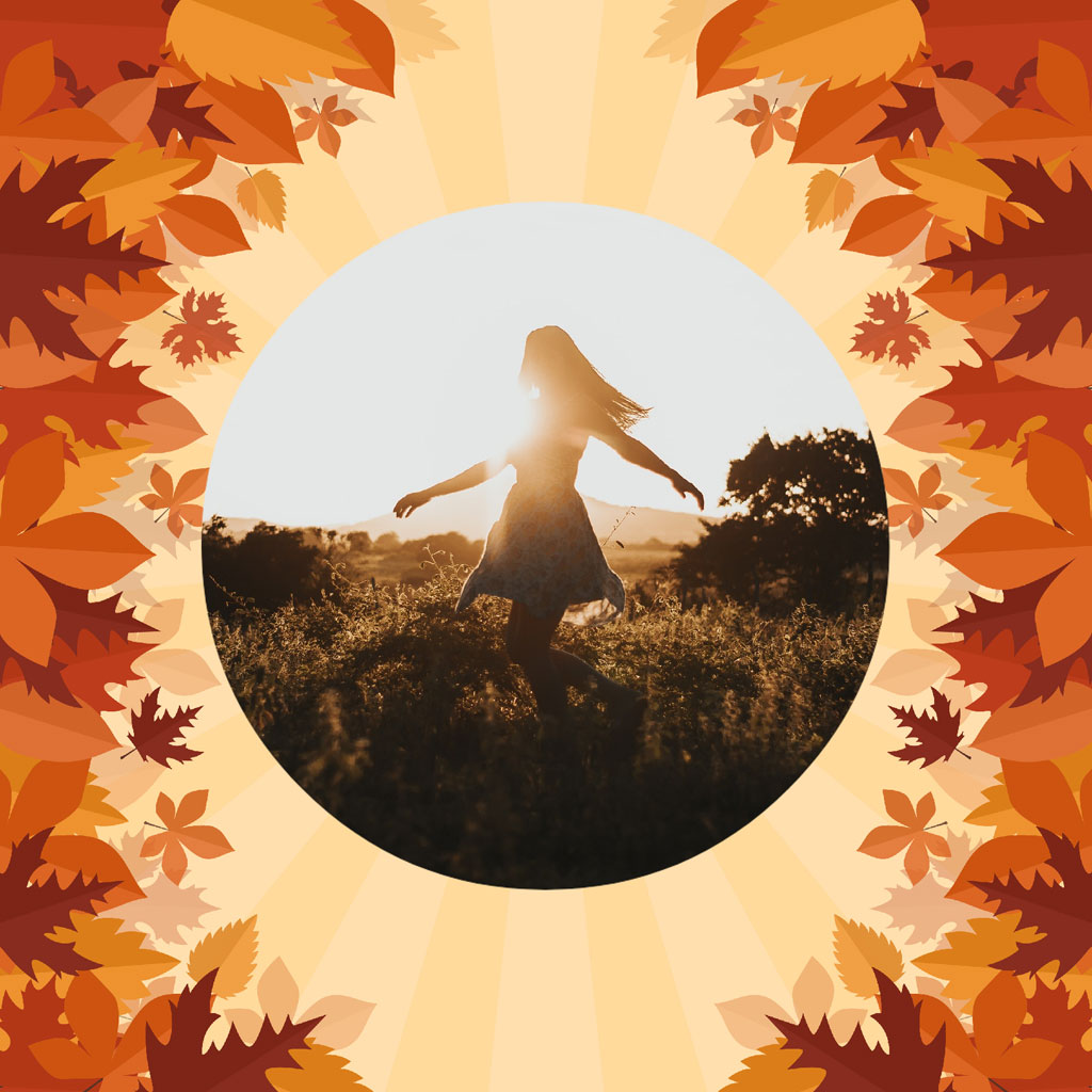 Woman dancing in a field during autumn