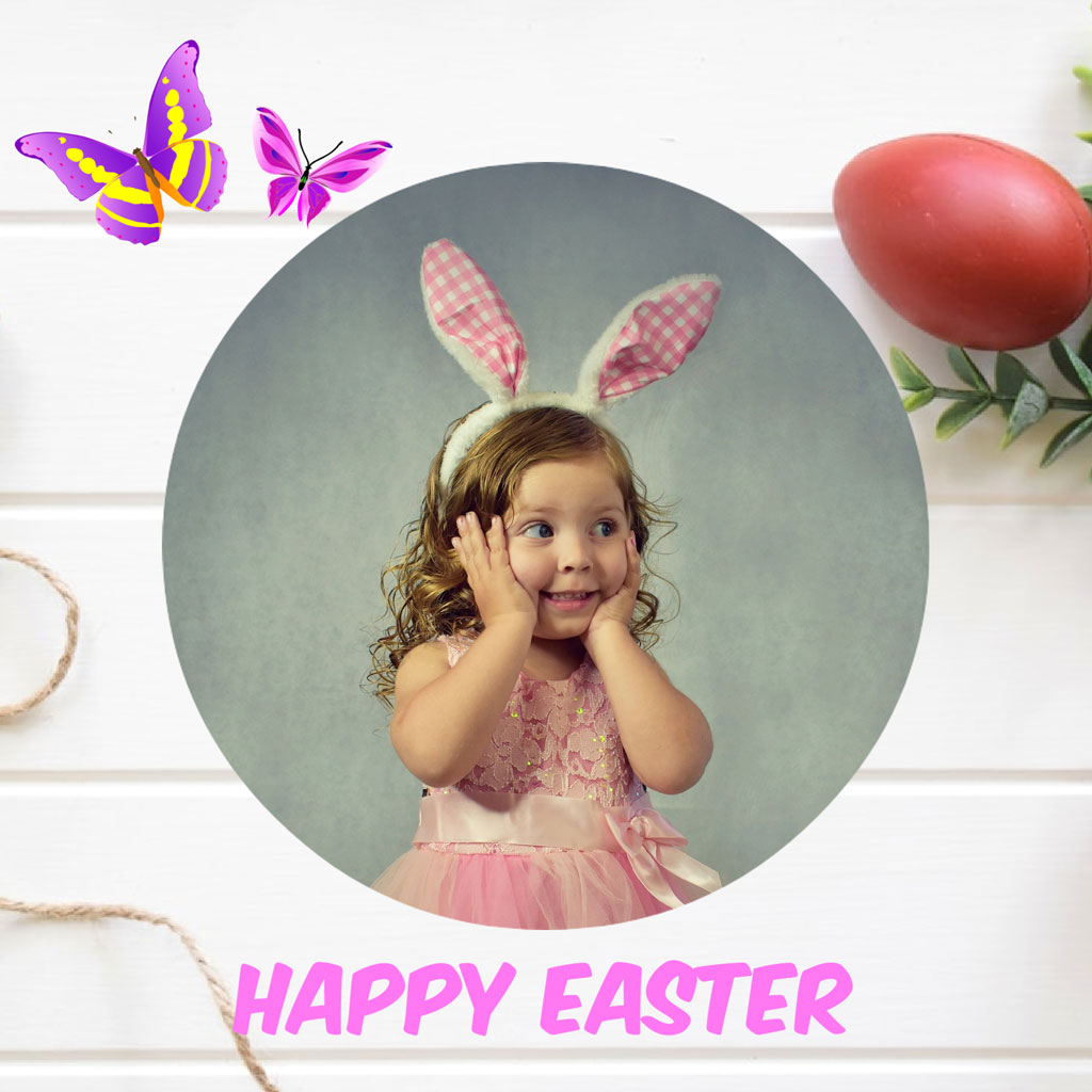 Little girl in pink dress with bunny ears