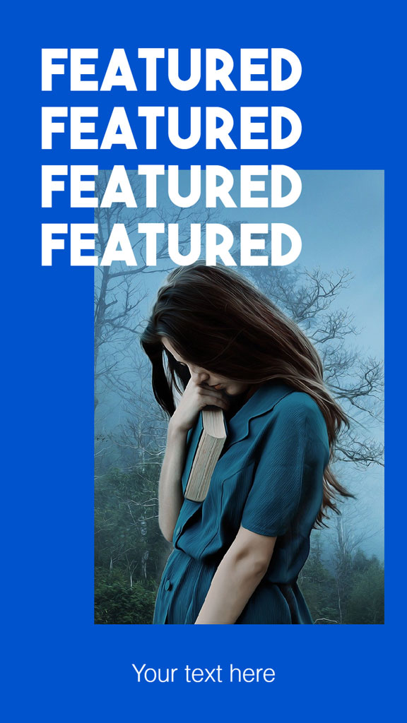 Woman in a blue dress standing in a misty forest