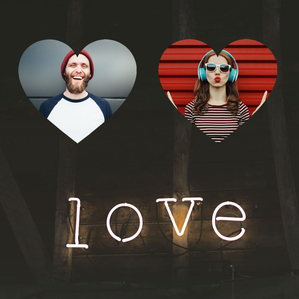 A man and woman in heart-shaped frames with a neon love sign