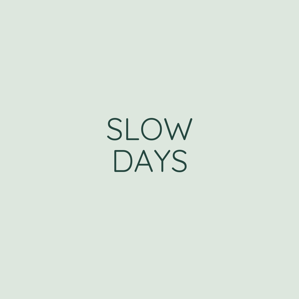 Minimal pale green cover with the words Slow Days centered in dark text.