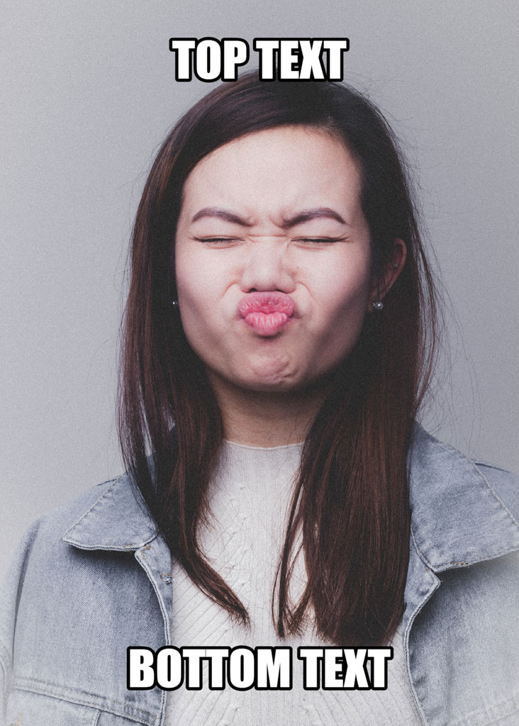 Woman with eyes closed and lips puckered, wearing denim jacket