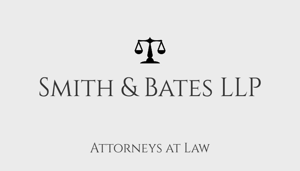 Smith & Bates LLP logo with scales of justice
