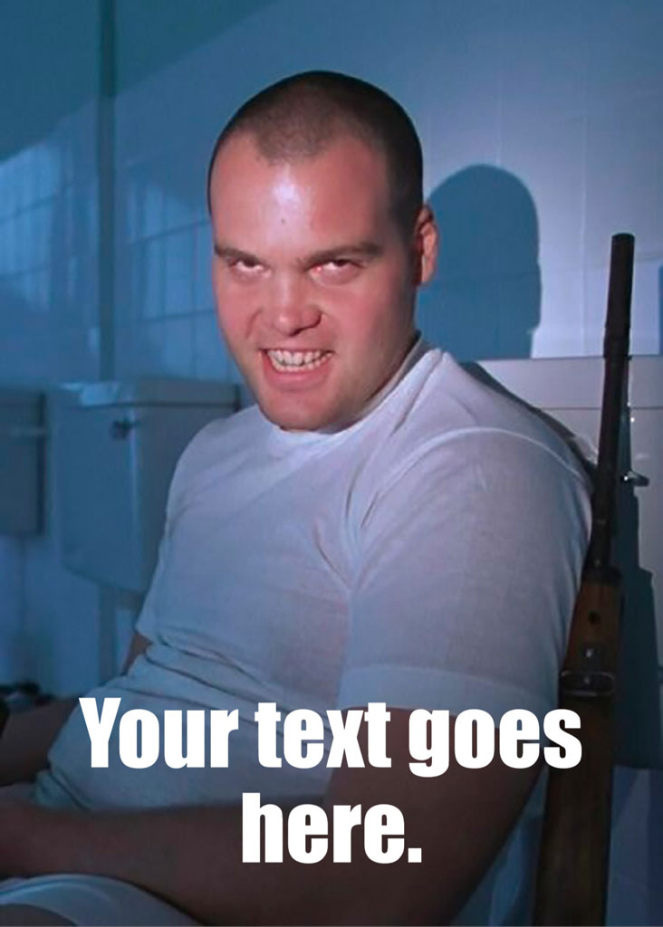 A man with a shaved head holding a rifle