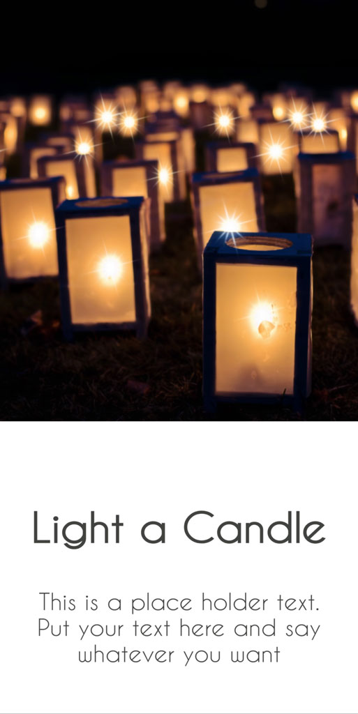 Multiple candles lit in a grassy field at night