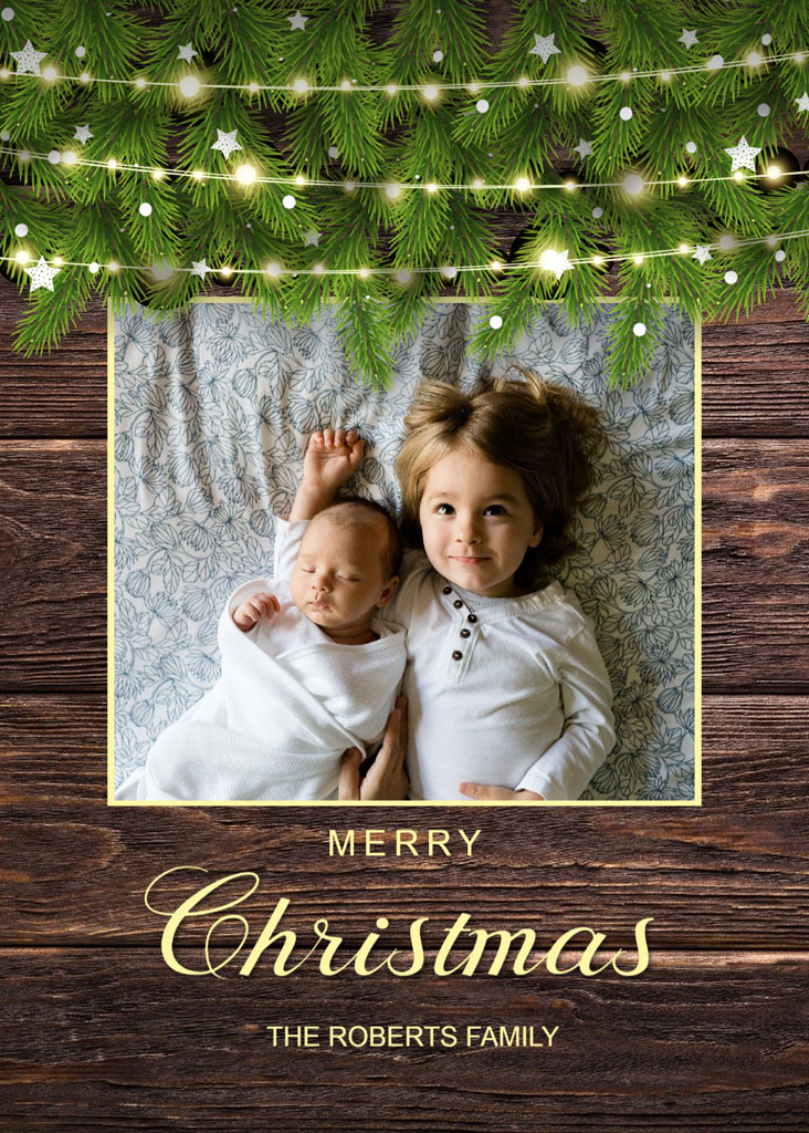 Christmas card with a photo of a girl and baby