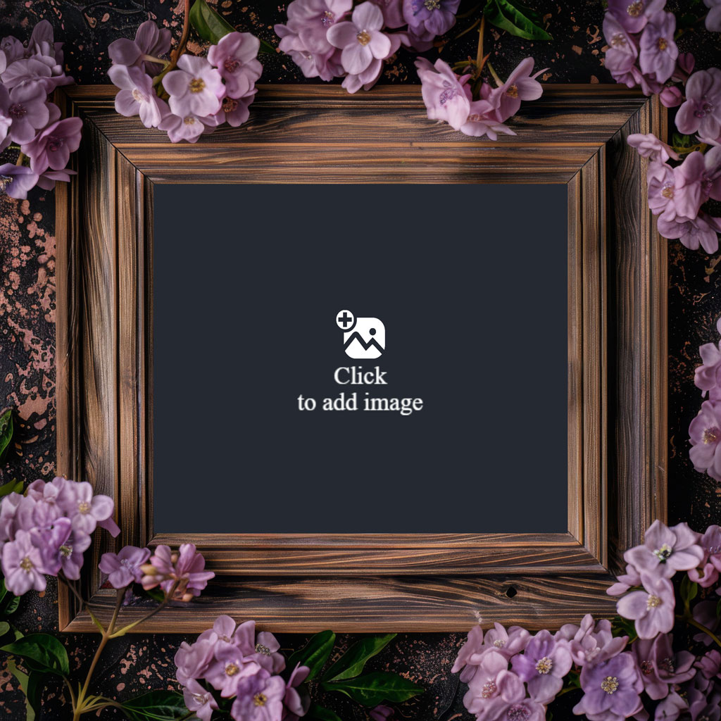 A wooden picture frame with a black center surrounded by pink flowers.