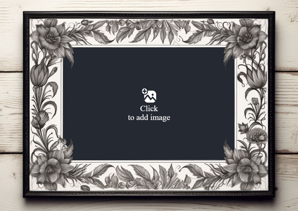 A black and white floral frame with a blank center on a wooden background.