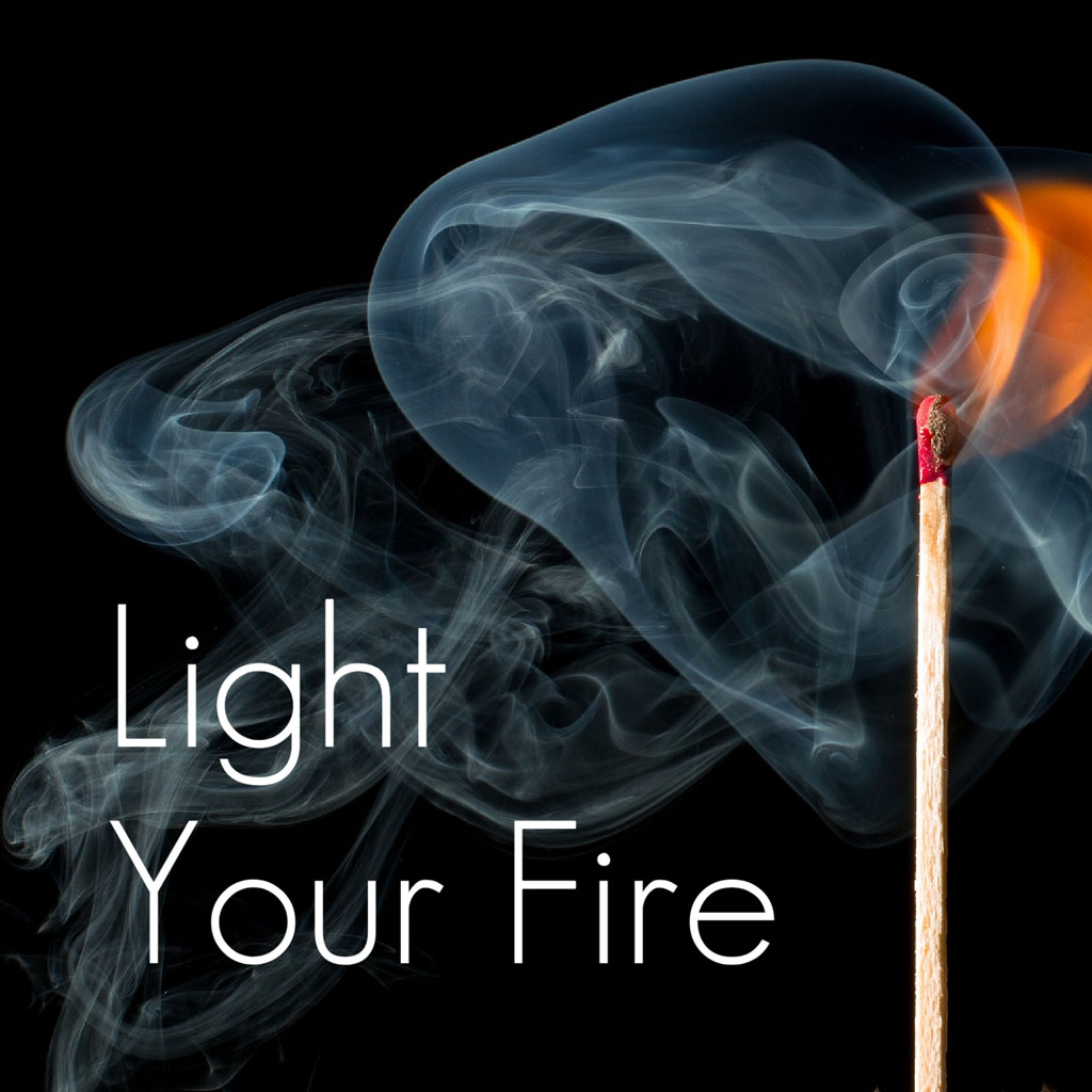 A lit matchstick with smoke and flame