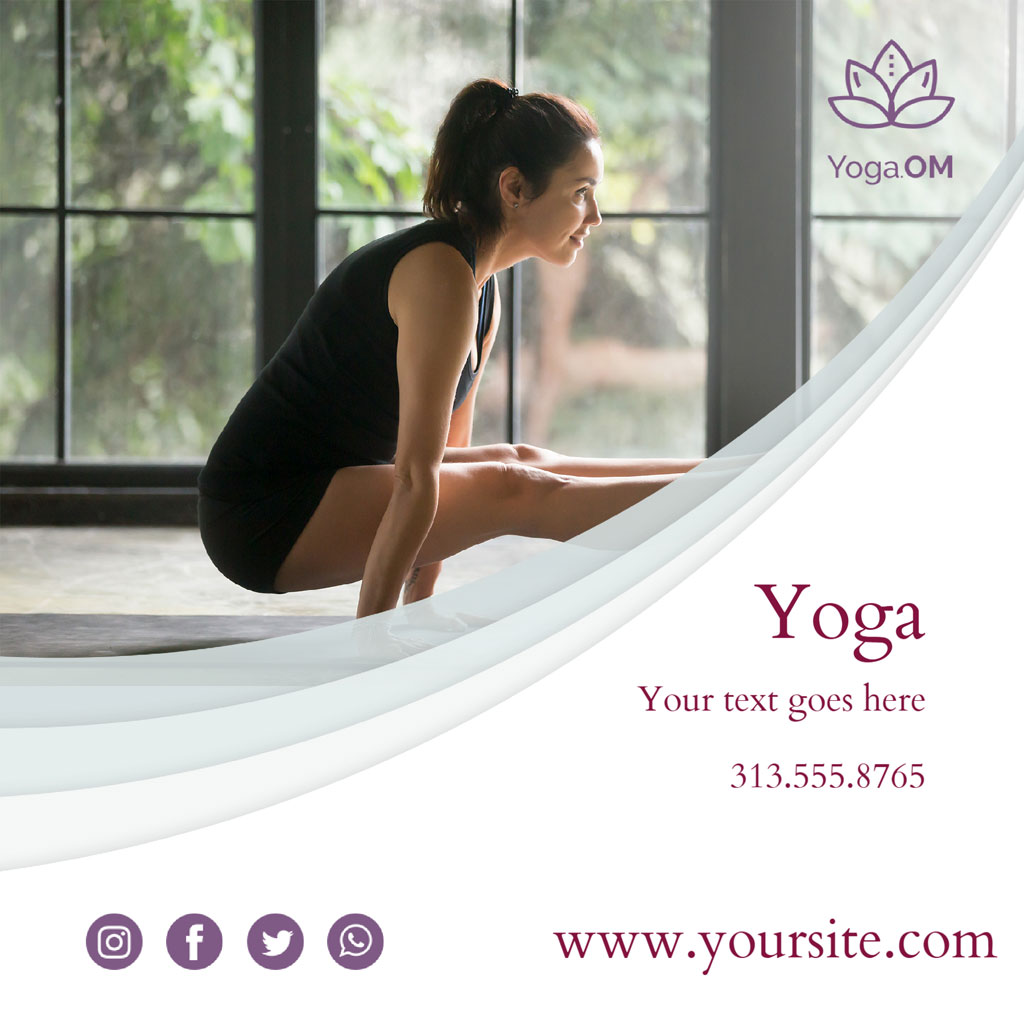 Woman in black yoga attire practicing yoga in a serene studio