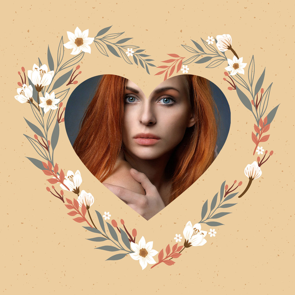 Red-haired woman in a heart-shaped frame with floral decorations