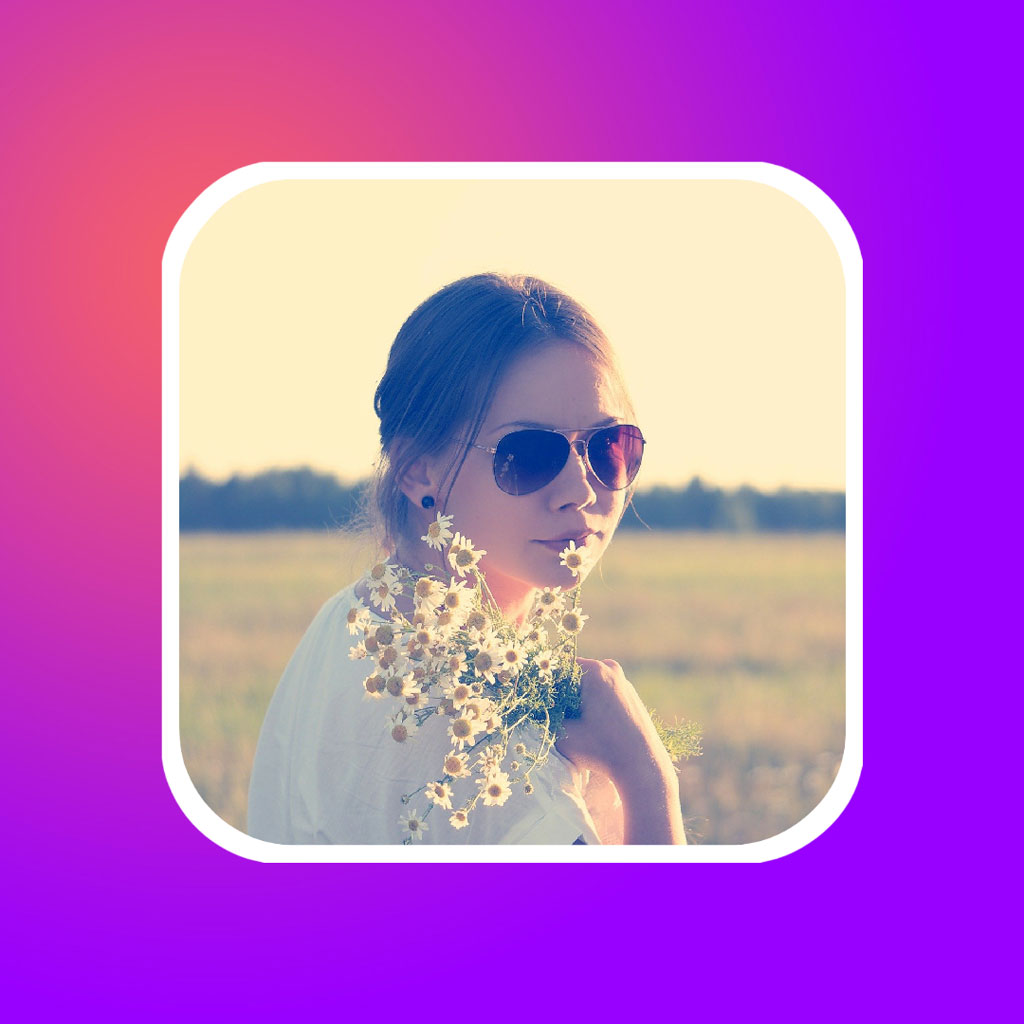 Woman wearing sunglasses with flowers around her neck in a field