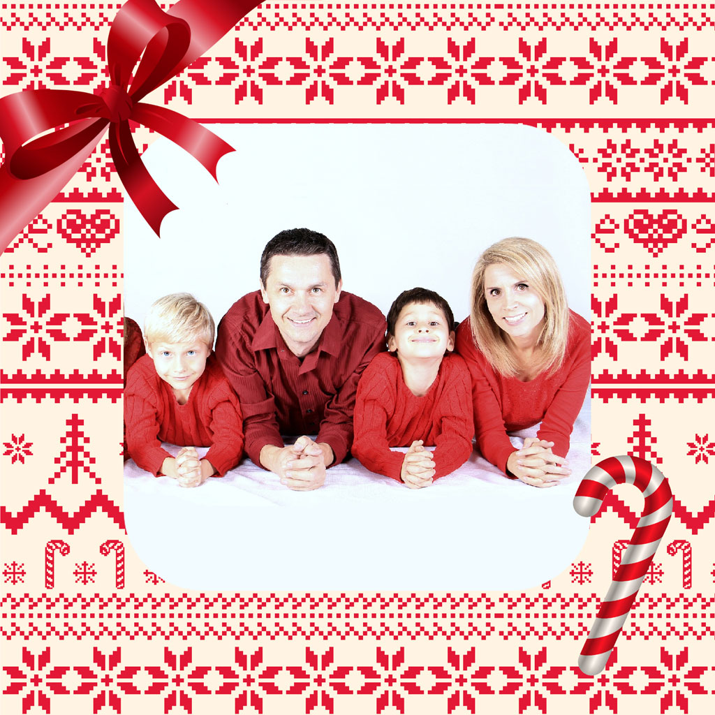 Family in red pajamas lying on the floor