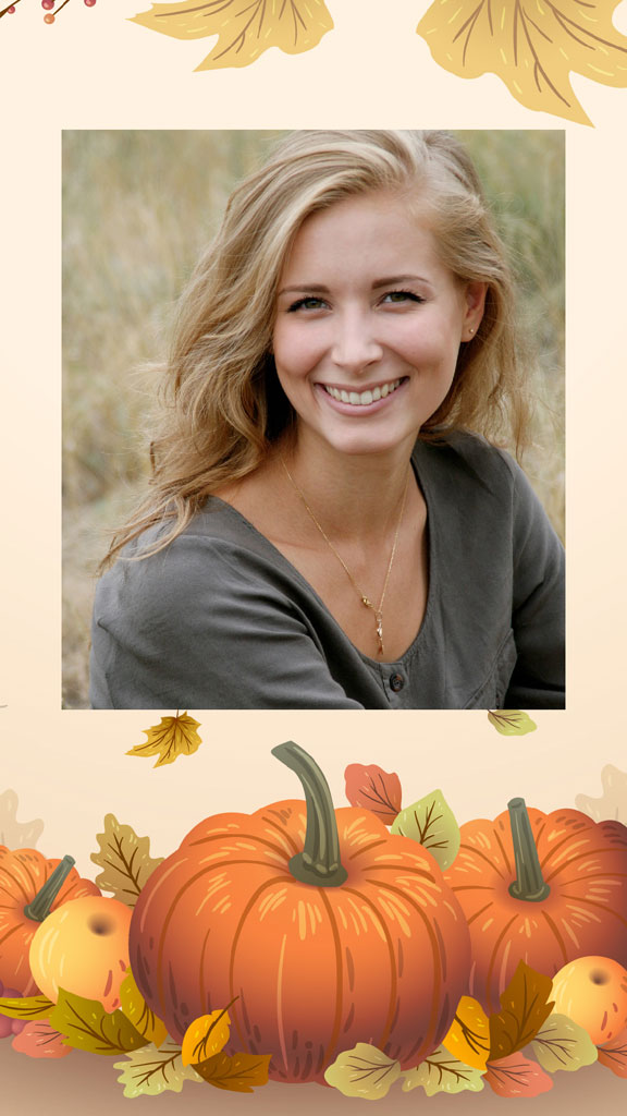 A smiling young woman with blonde hair in a gray shirt.