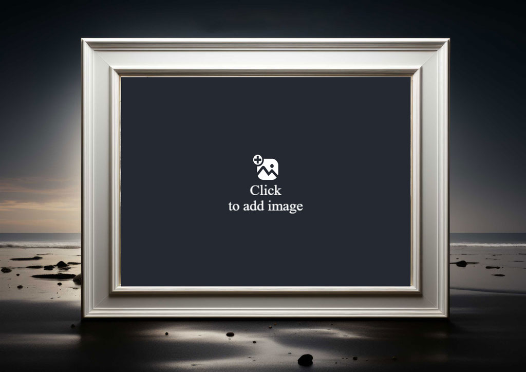 A silver picture frame on a beach with a dark background